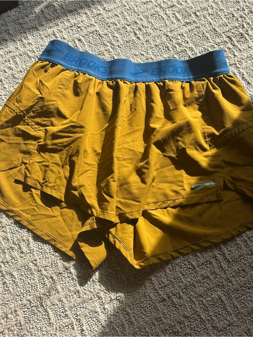 Brooks Women's Mustard Yellow Athletic Shorts with Blue Waistband